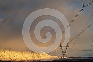 Electrical power lines and towers in desert valley