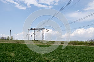 Electrical power lines and towers at sunset.