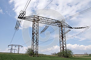 Electrical power lines and towers at sunset.