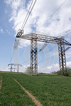 Electrical power lines and towers at sunset.