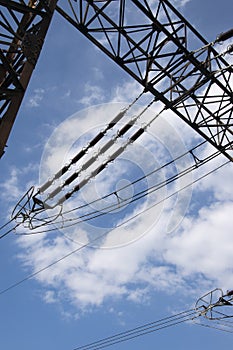 Electrical power lines and towers at sunset.