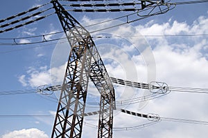 Electrical power lines and towers at sunset.