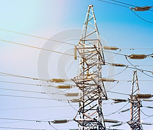 Electrical Power Lines under a blue sky. Tower