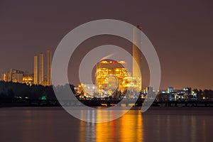 Electrical power plant near sea coat at night, Rayong, Thailand