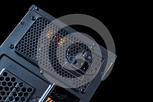 Electrical power supply for computer system unit components isolated on a black background