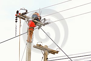 An electrical power utility worker photo