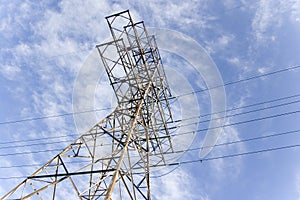 Electrical pylon against blue sky