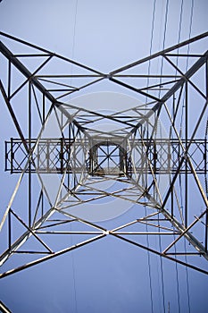 Electrical pylon against blue sky