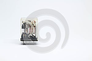 Electrical relay on white background.