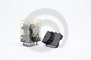 Electrical relay on white background.