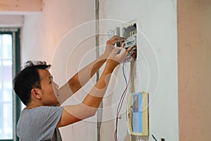 Electrical renovation work, Man install Industrial electrical equipment