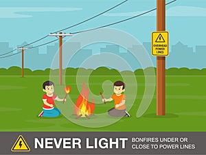Two kids playing with fire near power lines. Never light bonfires under or close to power lines warning design. photo