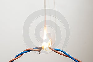 Electrical Short circuit, burnt cable, on white color background