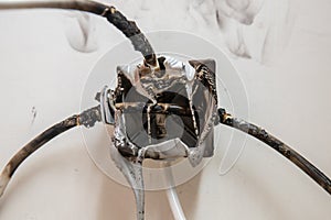 Electrical short circuit. Cable wiring is on fire, splitter is self-igniting