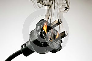 Bad electrical connection in plug starting a fire in a socket outlet.