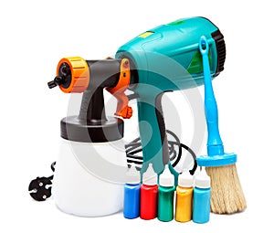 Electrical spray gun for coloration and a paintbrush and small bottles with color