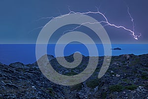 An electrical storm over the sea at sunset