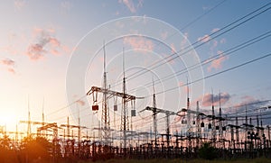 Electrical substation silhouette on the dramatic sunset background