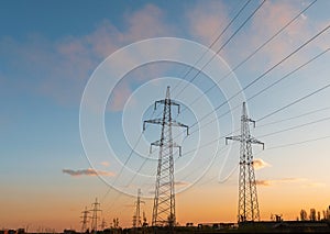 Electrical substation silhouette on the dramatic sunset background