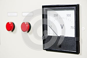 Electrical switch panel with button and voltmeter photo