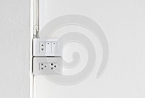 Electrical switch and plug on wall