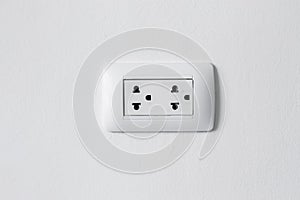 Electrical switch and plug on wall