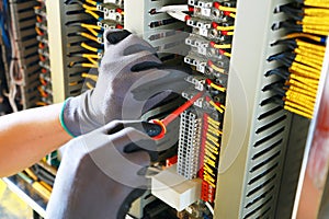 Electrical terminal in junction box and service by technician. Electrical device install in control panel for support program