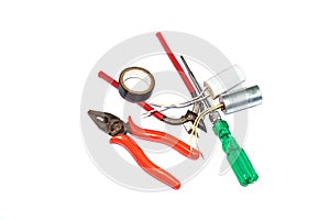 electrical tools are black tape, screwdriver, electric tester, wirecutter, capacitors, pliers are isolated on white background photo