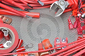 Electrical tools, component and cables on metal surface