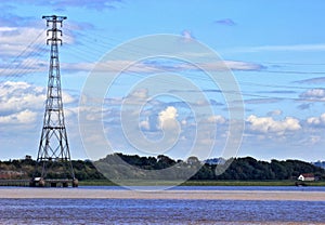 Electrical tower on the Severn River at Aust, England.