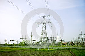 Electrical towers on blue sky background