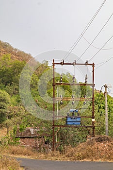 An electrical transformer in a typical indian village