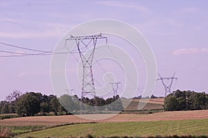 Electrical Transmission Towers Electricity Pylons at Sunset