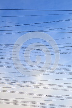 Electrical wire under blue sky