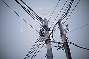 Electrical wires against sky. Wires on pole. Urban infrastructure