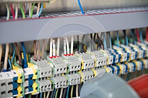electrical wires in a perforated cable channel,connection to circuit breakers