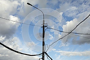 Electrical wires and pole. City light. Electric infrastructure in city