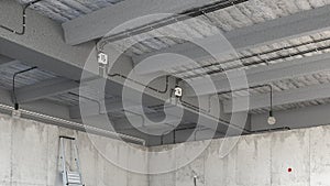 Electrical wiring on a beamed ceiling,