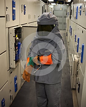 Electrical worker in protective gear