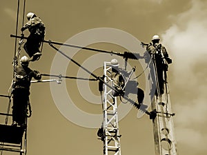 Electrical workers on overhead line