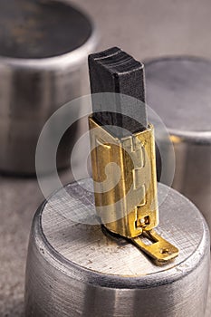 Electrically conductive graphite brush of a motor