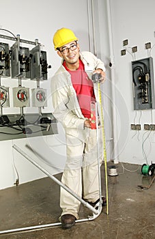 Electrician Bending Pipe photo