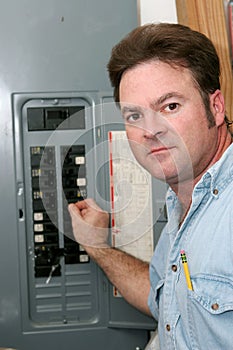 Electrician At Breaker Panel photo