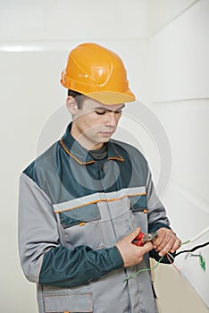 Electrician at cabling work