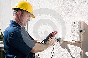 Electrician Checking Voltage photo