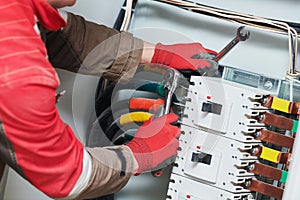 Electrician connecting power cable