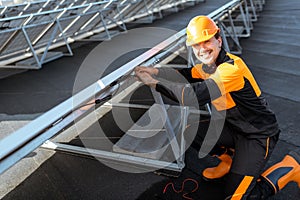 Electrician connecting solar panels