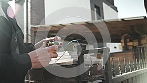 Electrician connects the yellow Signal Lamp for the gate