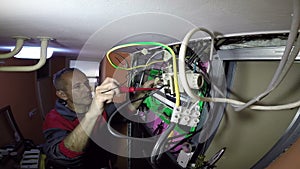 Electrician With Electrical Cables and Wires