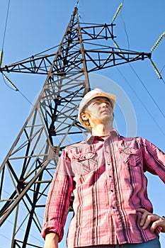 Electrician on an electricity pylon